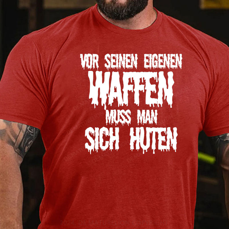 Vor seinen eigenen Waffen muss man sich hüten T-Shirt