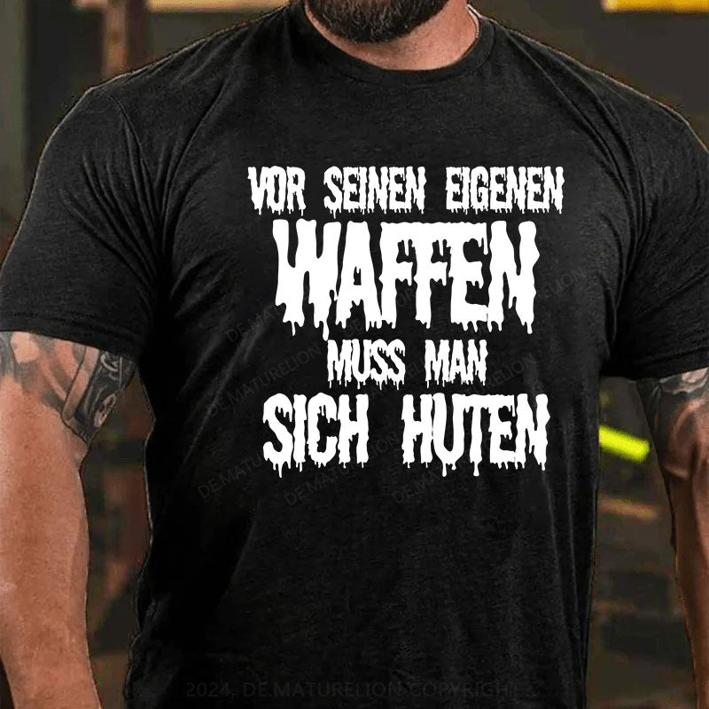 Vor seinen eigenen Waffen muss man sich hüten T-Shirt