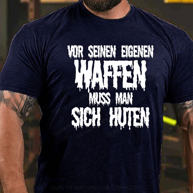 Vor seinen eigenen Waffen muss man sich hüten T-Shirt