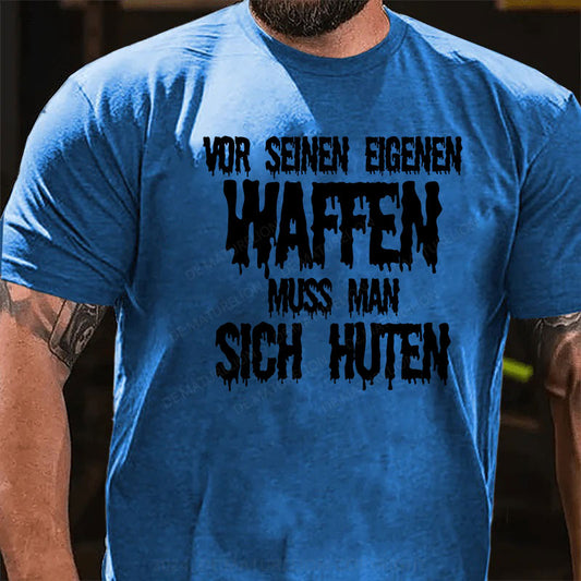 Vor seinen eigenen Waffen muss man sich hüten T-Shirt